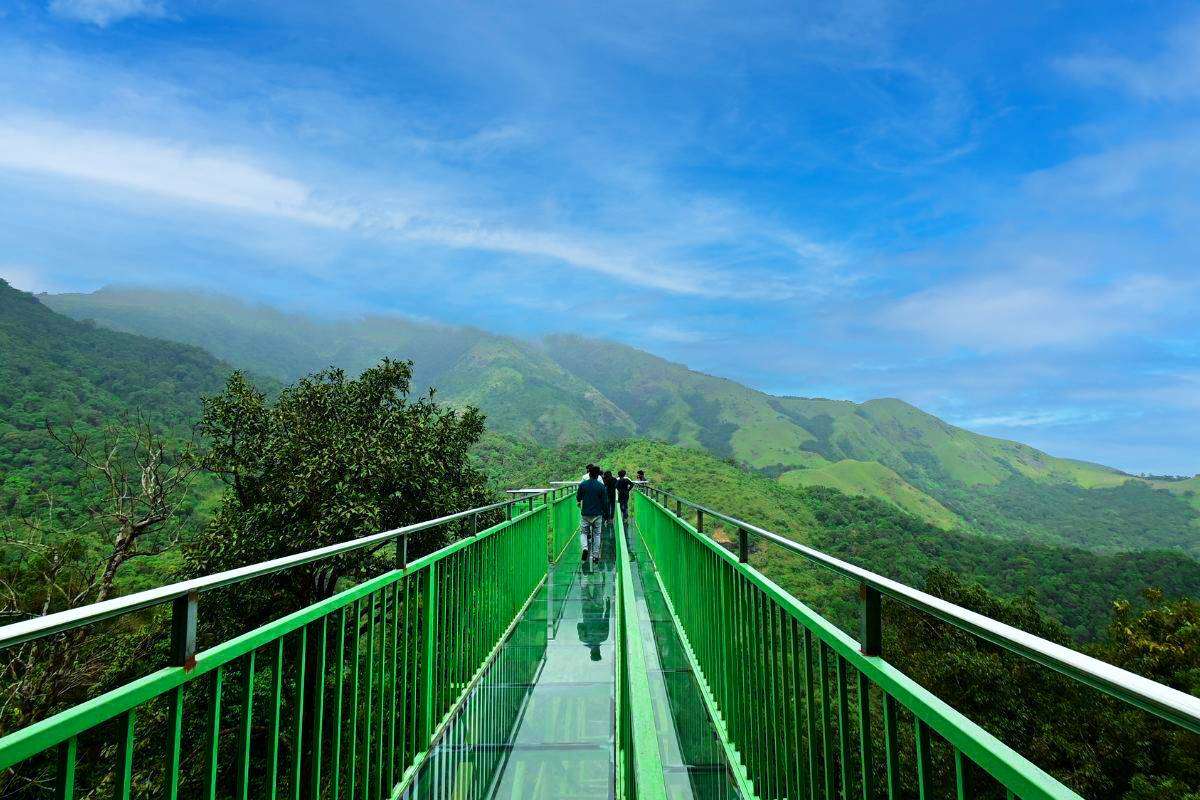 Coimbatore to 900 Kandi Glass Bridge Wayanad Tour Packages
